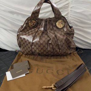 Coated canvas Gucci arm bag